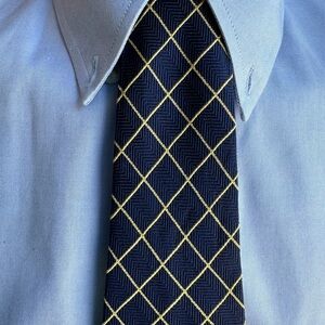 Brooks Brothers makers.Navy and Gold Checkered Tie. 100% silk.